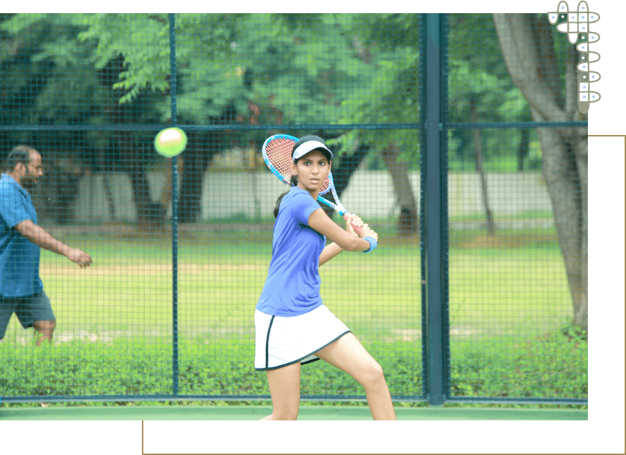 A girl playing tennis